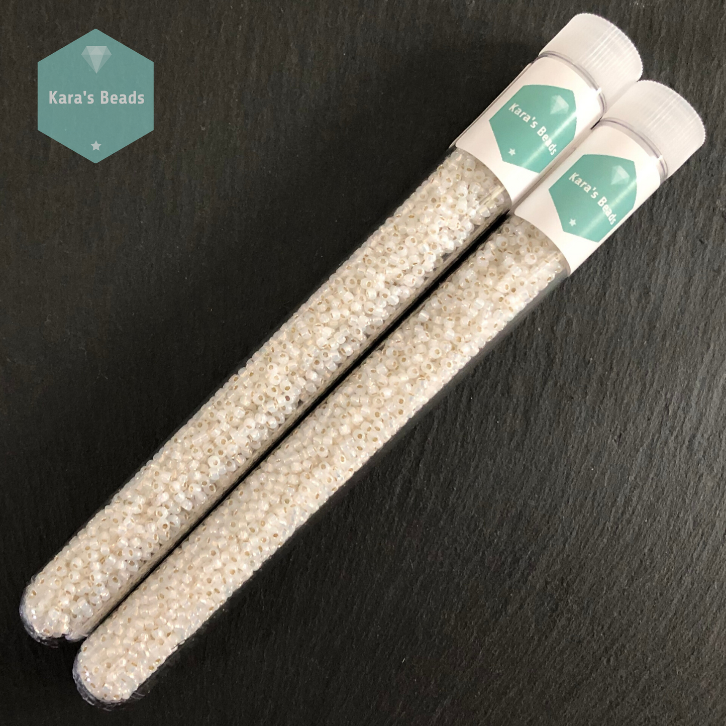 25g Tube 11/0 Toho TR11-2100 Silver Lined Milky White