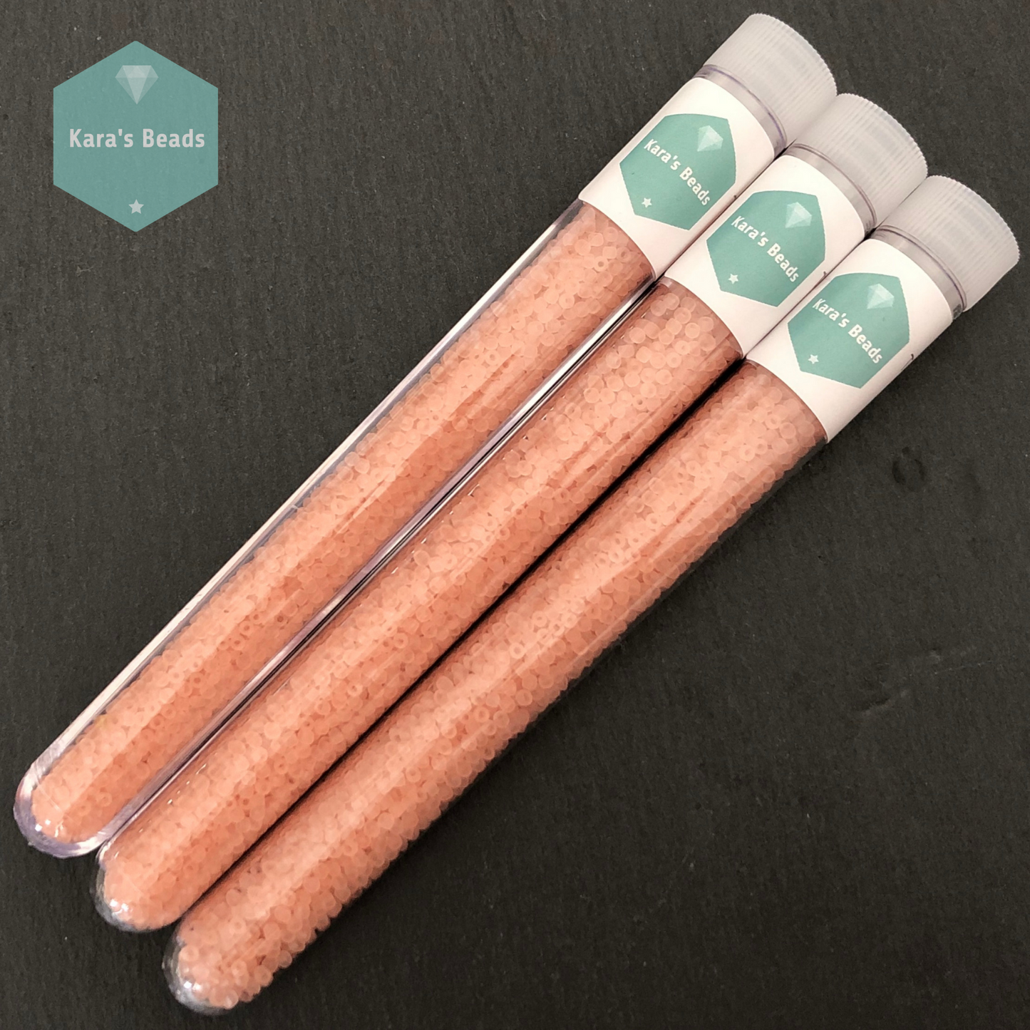 25g Tube 11/0 Toho TR11-11F Transparent Frosted Rosaline