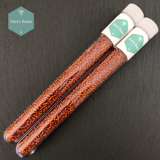 25g Tube 11/0 Toho TR11-2208 Silver Lined Burnt Orange