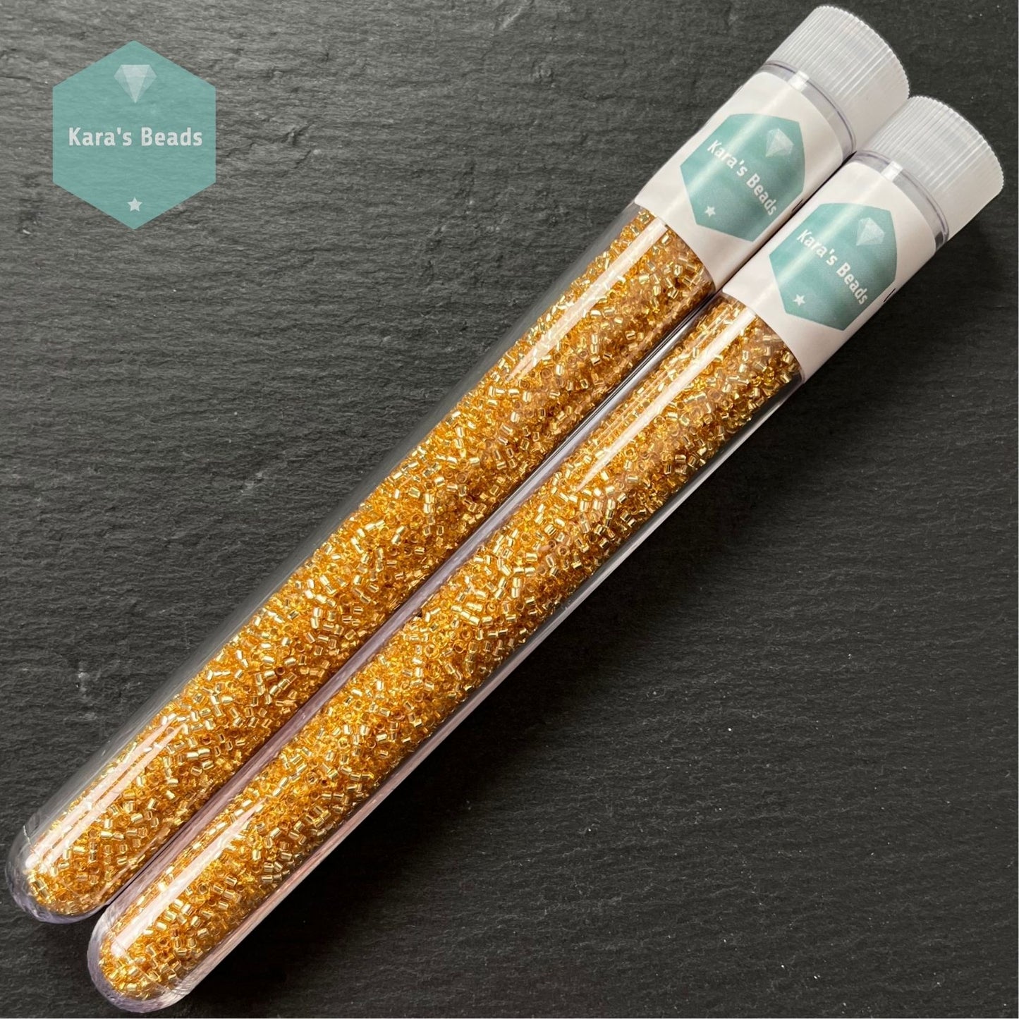 22g Tube 11/0 Miyuki Delica DB0042 Silver Lined Gold