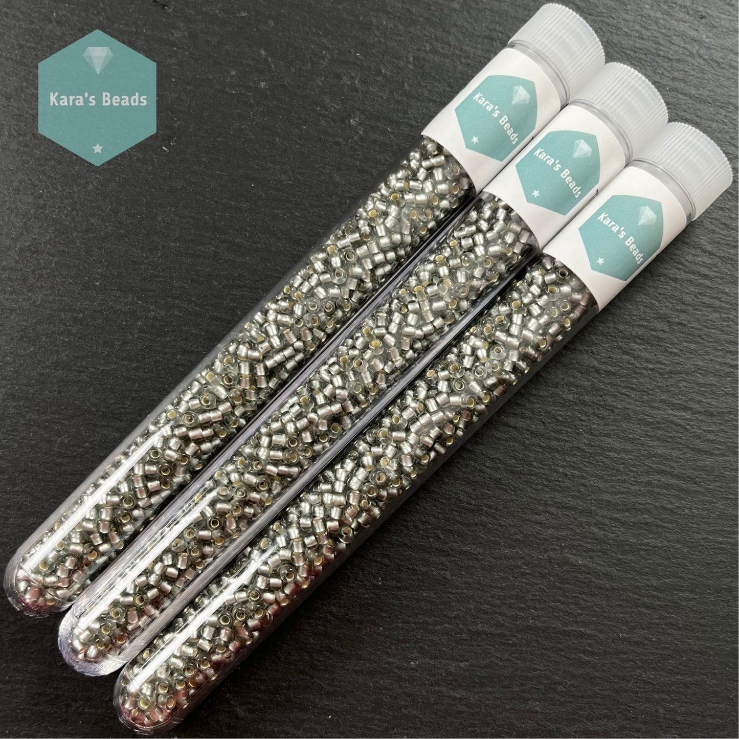 25g Tube 8/0 Toho TR8-29AF Silver Lined Frosted Black Diamond