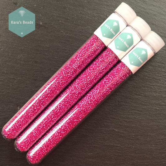 25g Tube 15/0 Toho TR15-2107 Silver Lined Milky Hot Pink