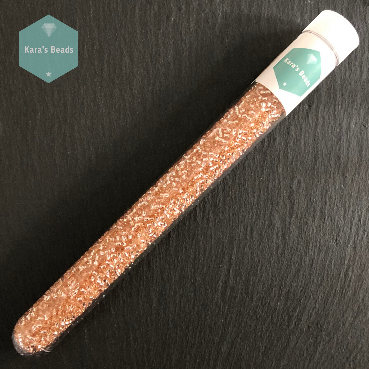 25g Tube 11/0 Toho TR11-31 Silver Lined Rosaline