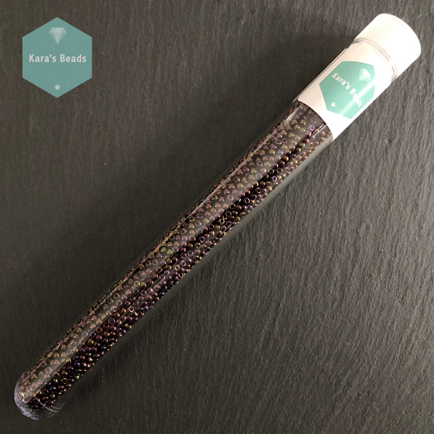 25g Tube 11/0 Toho TR11-85 Metallic Iris Purple