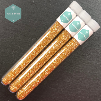 25g Tube 15/0 Toho TR15-22 Silver Lined Light Topaz