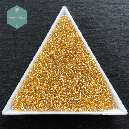 25g Tube 15/0 Toho TR15-22 Silver Lined Light Topaz