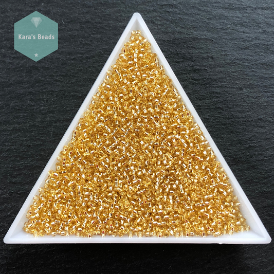 25g Tube 15/0 Toho TR15-22 Silver Lined Light Topaz