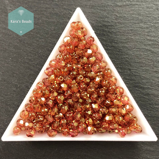 300pcs Tube 4mm Fire Polish 00030/15695 Crystal Lila Gold Luster