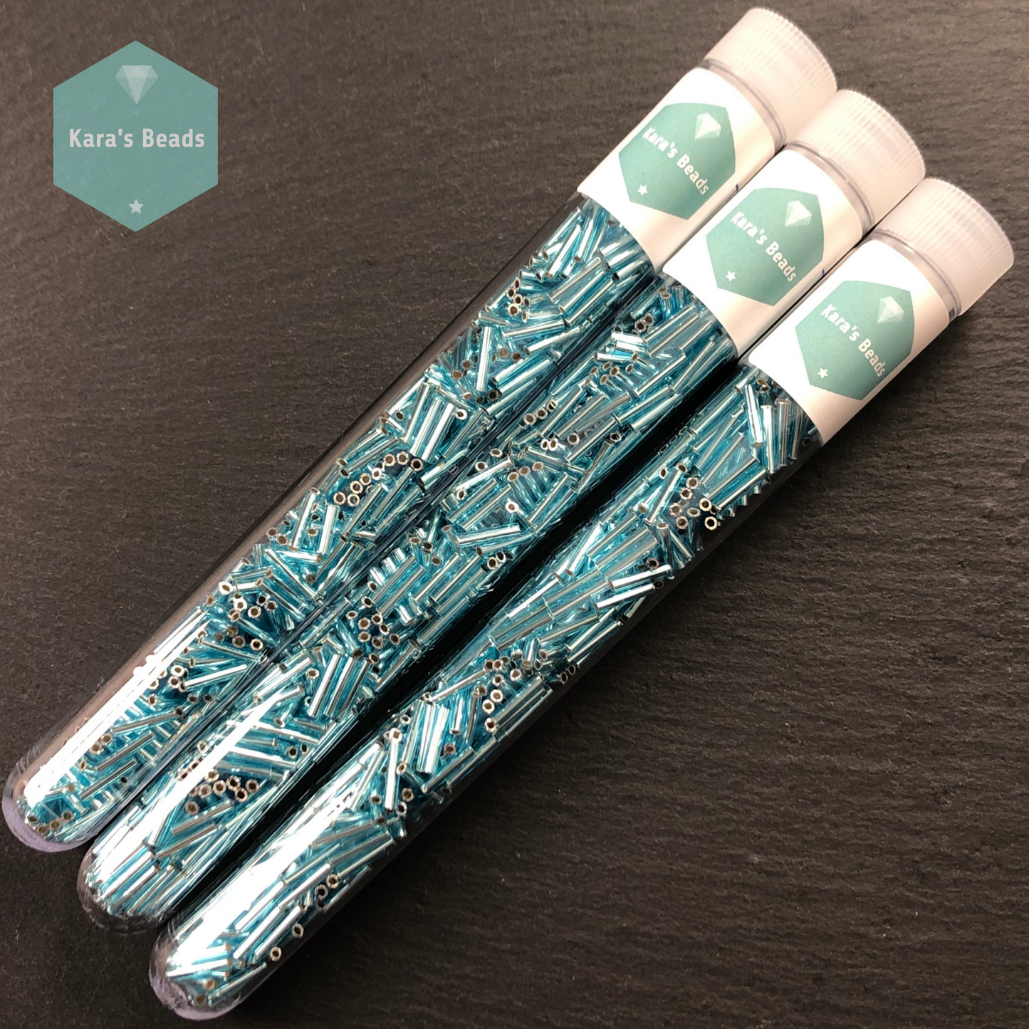 18g Tube 9mm Toho Bugles TB3-23 Silver Lined Aquamarine