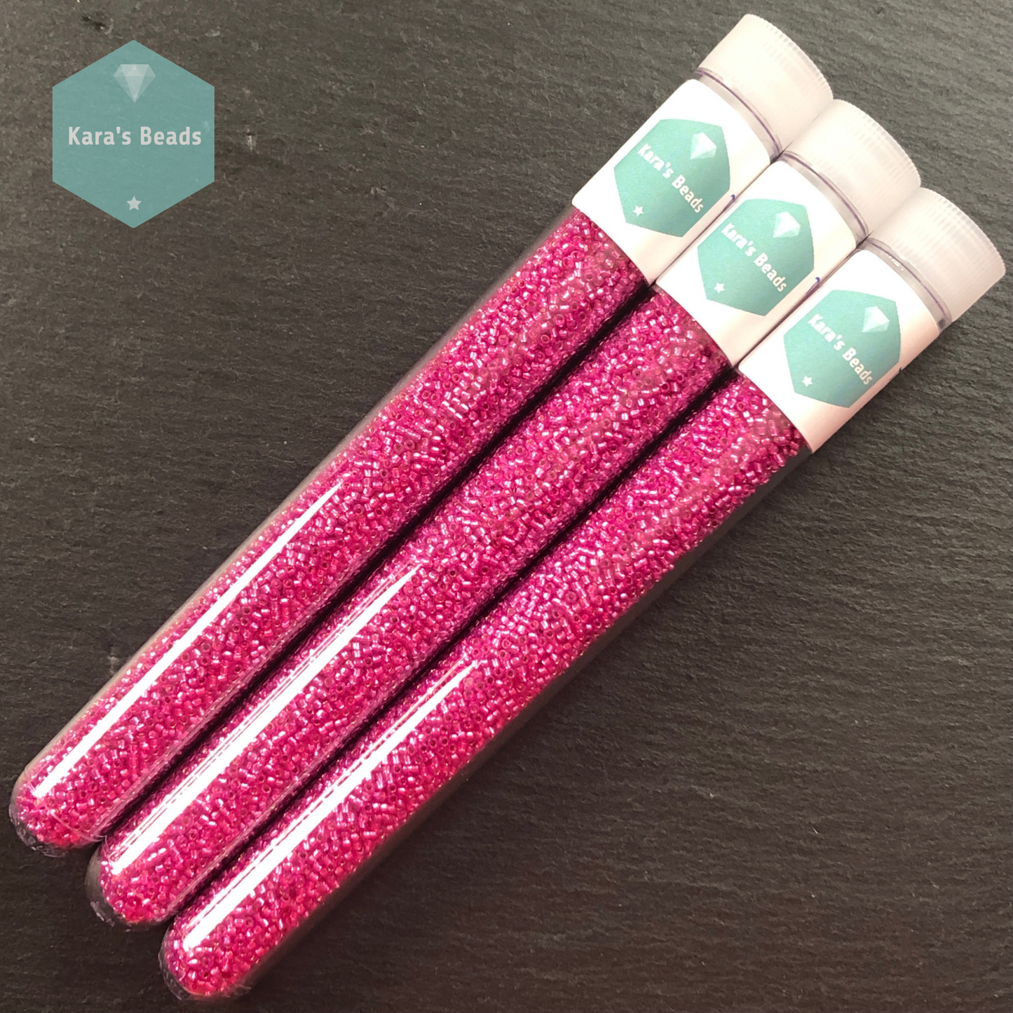 25g Tube 15/0 Toho TR15-2107 Silver Lined Milky Hot Pink