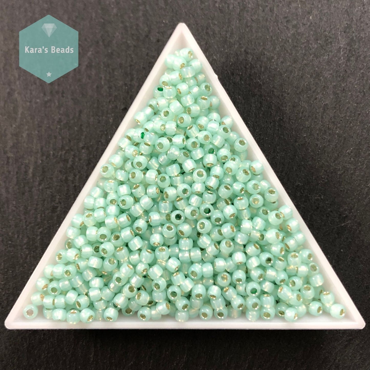 25g Tube 8/0 Toho TR8-2118 Silver Lined Milky Light Peridot